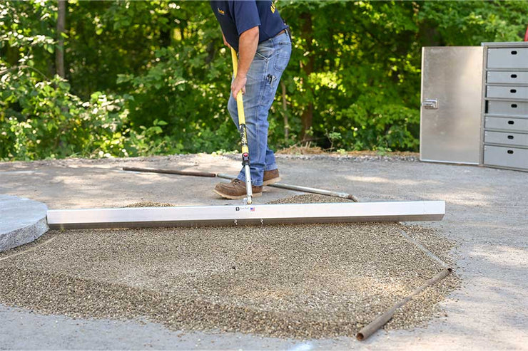 Quick-E Screeder Package screeds polymeric sand without bending over and comes with three different lengths. Made in America
