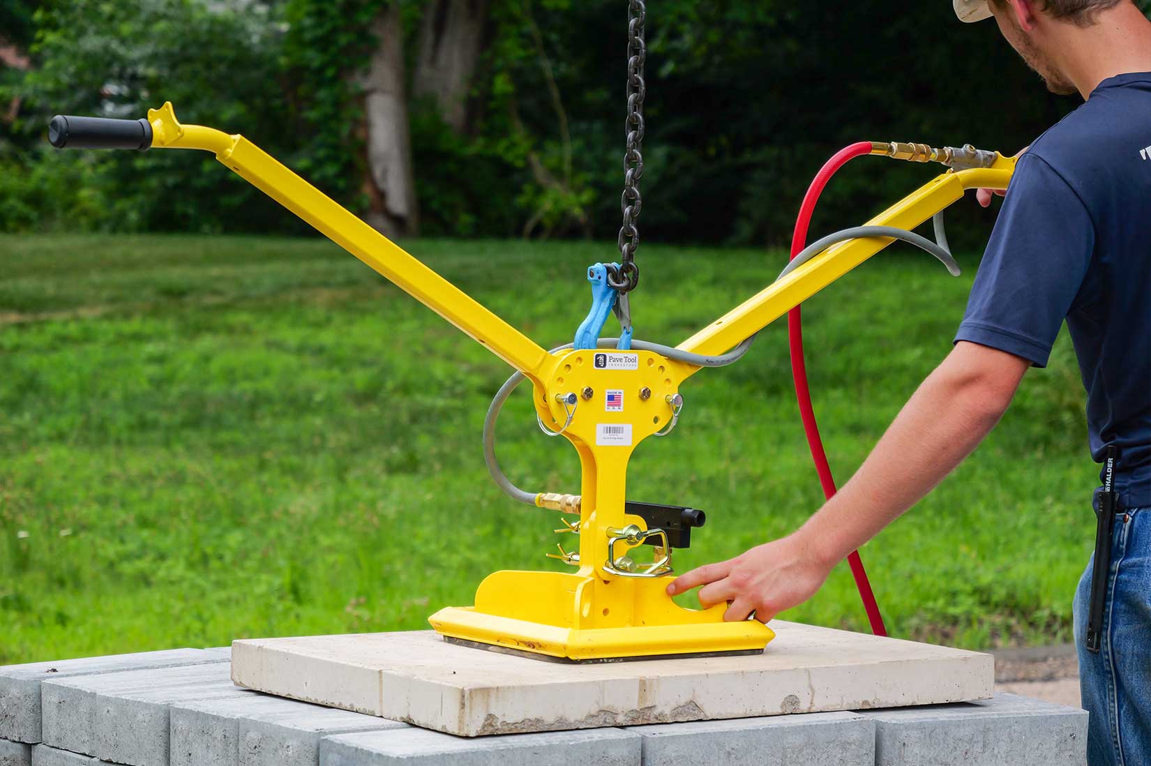 suction equipment picking up slab