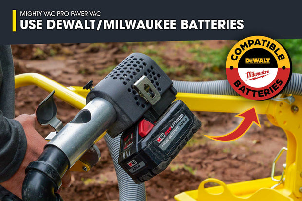 Mighty Vac Pro Paver Vac with Dewalt and Milwaukee batteries on a construction site background