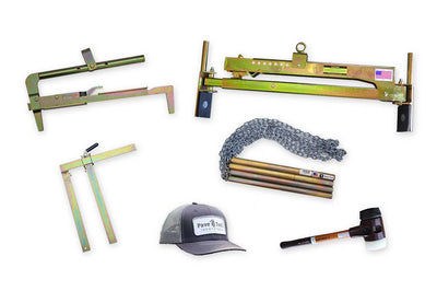 Collection of tools including a hat, mallet, and block clamps on a white background