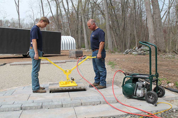 Using the Quick-E-Ergo XL with the ES Standard Power Pack, ES Pad Size 12" x 12", ES Toggle Switch, ES Power Pack Insert to Pick Natural Stone using Suction, Suction Pump, suction System, Suction Hardscape tools